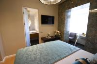 Luxury Rooms Fortunaにあるテレビまたはエンターテインメントセンター