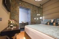 Luxury Rooms Fortunaにあるベッド