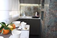 Luxury Rooms Fortunaにあるキッチンまたは簡易キッチン