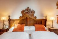 A bed or beds in a room at Can Tem Turismo de Interior