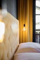 Łóżko lub łóżka w pokoju w obiekcie Boutique House happYellow Saalbach, inkl JokerCard