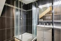 a bathroom with a shower and a sink at 852 Suite Élégante - Superb Apartement in Asnières-sur-Seine