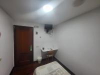 Televízia a/alebo spoločenská miestnosť v ubytovaní Hostal La Frontera