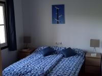 A bed or beds in a room at Las Palmeres 6
