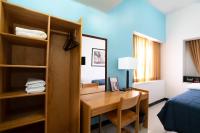 Ein Bett oder Betten in einem Zimmer der Unterkunft West Side YMCA