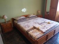 Postel nebo postele na pokoji v ubytování Къща за гости Жорж