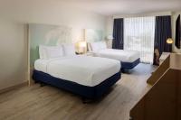 Hotel Dello Ft Lauderdale Airport, Tapestry Collection by Hiltonにあるベッド