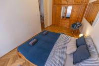 Postel nebo postele na pokoji v ubytování Ráday Corner Apartment
