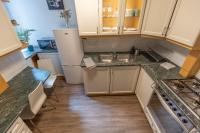 Kuchyň nebo kuchyňský kout v ubytování Ráday Corner Apartment