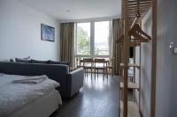 Postel nebo postele na pokoji v ubytování Kordon Apartment