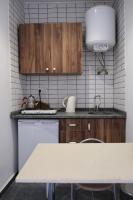 Kuchyň nebo kuchyňský kout v ubytování Kordon Apartment