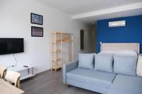 TV a/nebo společenská místnost v ubytování Kordon Apartment