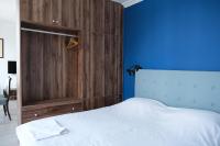 Postel nebo postele na pokoji v ubytování Kordon Apartment