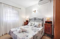 Postel nebo postele na pokoji v ubytování Casa Rodri