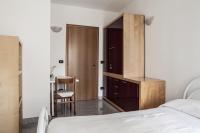 A bed or beds in a room at Bed & Breakfast Cesarina