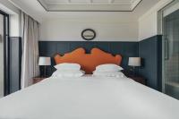 Sugar Marina Hotel -AVIATOR- Phuket Airportにあるベッド