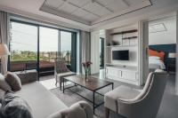Sugar Marina Hotel -AVIATOR- Phuket Airportにあるテレビまたはエンターテインメントセンター