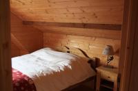 Letto o letti in una camera di Les Marmottes de l&#39;Alpe