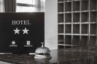 Messini Hotelに飾ってある許可証、賞状、看板またはその他の書類