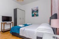 Posteľ alebo postele v izbe v ubytovaní Apartments Tabak
