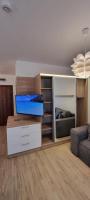 TV a/nebo společenská místnost v ubytování Studio CASCADAS FAMILY RESORT
