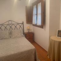 A bed or beds in a room at Casa rural La Aldea