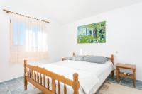Posteľ alebo postele v izbe v ubytovaní Apartments by the sea Sevid, Trogir - 4287