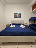 Posteľ alebo postele v izbe v ubytovaní Clary Home Cefalu'