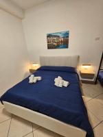Posteľ alebo postele v izbe v ubytovaní Clary Home Cefalu'