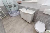 Kúpeľňa v ubytovaní Apartments Tabak