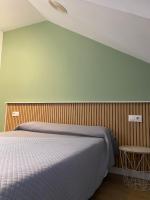 Posteľ alebo postele v izbe v ubytovaní Hostal La Frontera