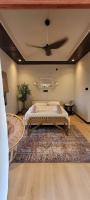 Rumah Seruni@Zaki's Residenceにあるベッド