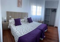 Postel nebo postele na pokoji v ubytování Viviendas vacacionales as lagas