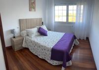 Postel nebo postele na pokoji v ubytování Viviendas vacacionales as lagas