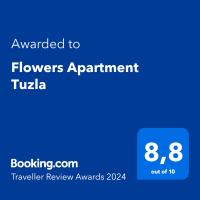 a blue screen with the text awarded to flowers appointment tula at Flowers Apartment Tuzla in Tuzla