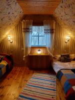 Postel nebo postele na pokoji v ubytování Tõnise Holiday Houses