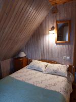 Postel nebo postele na pokoji v ubytování Tõnise Holiday Houses