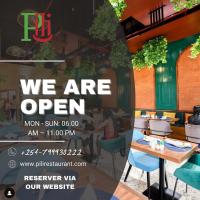 Et logo, certifikat, skilt eller en pris der bliver vist frem på GTC Posh Hideaway in Westlands