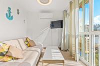 TV a/nebo společenská místnost v ubytování Alco apartamentos: Playmon Park