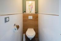 a small bathroom with a toilet in a room at Appartement d&#39;une chambre avec terrasse et wifi a Furiani a 3 km de la plage in Furiani