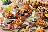 a table topped with lots of different types of food at OMO5 Hakodate by Hoshino Resorts in Hakodate