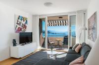 Televízia a/alebo spoločenská miestnosť v ubytovaní Luxury residence Adriatic Pearl