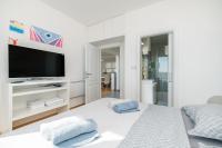 Televízia a/alebo spoločenská miestnosť v ubytovaní Luxury residence Adriatic Pearl