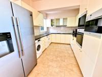 Kuchyň nebo kuchyňský kout v ubytování Paphos Central Penthouse