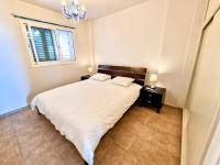 Postel nebo postele na pokoji v ubytování Paphos Central Penthouse