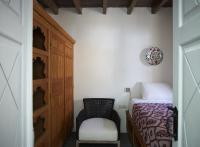 Posteľ alebo postele v izbe v ubytovaní Aquavisionaire Beach Front Villa