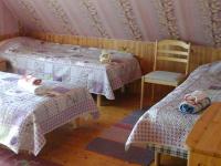 Postel nebo postele na pokoji v ubytování Tõnise Holiday Houses