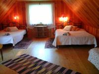 Postel nebo postele na pokoji v ubytování Tõnise Holiday Houses
