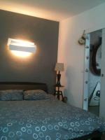 Postel nebo postele na pokoji v ubytov&aacute;n&iacute; Appartement proche Paris