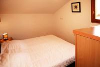 Łóżko lub łóżka w pokoju w obiekcie Résidence Parc Des Airelles - Rare à la location appartement 10 personnes 102m² MAE-7344